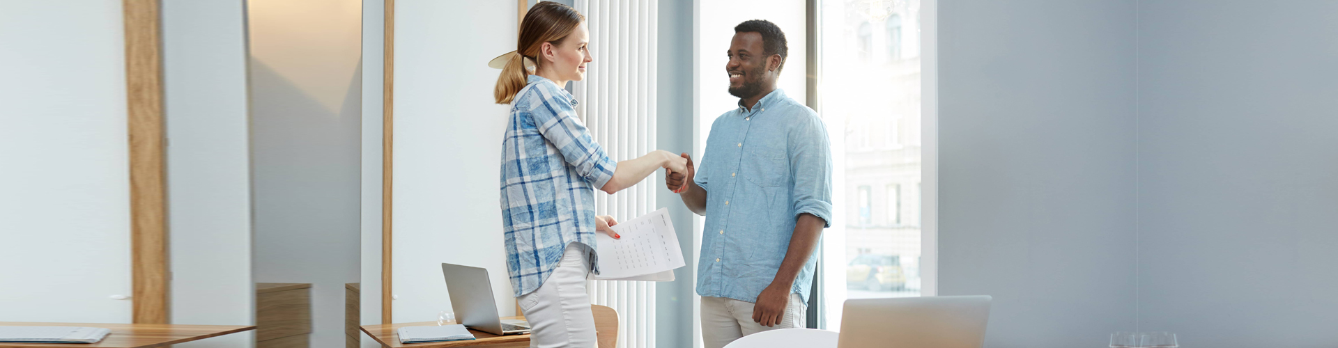 man and woman shaking hands